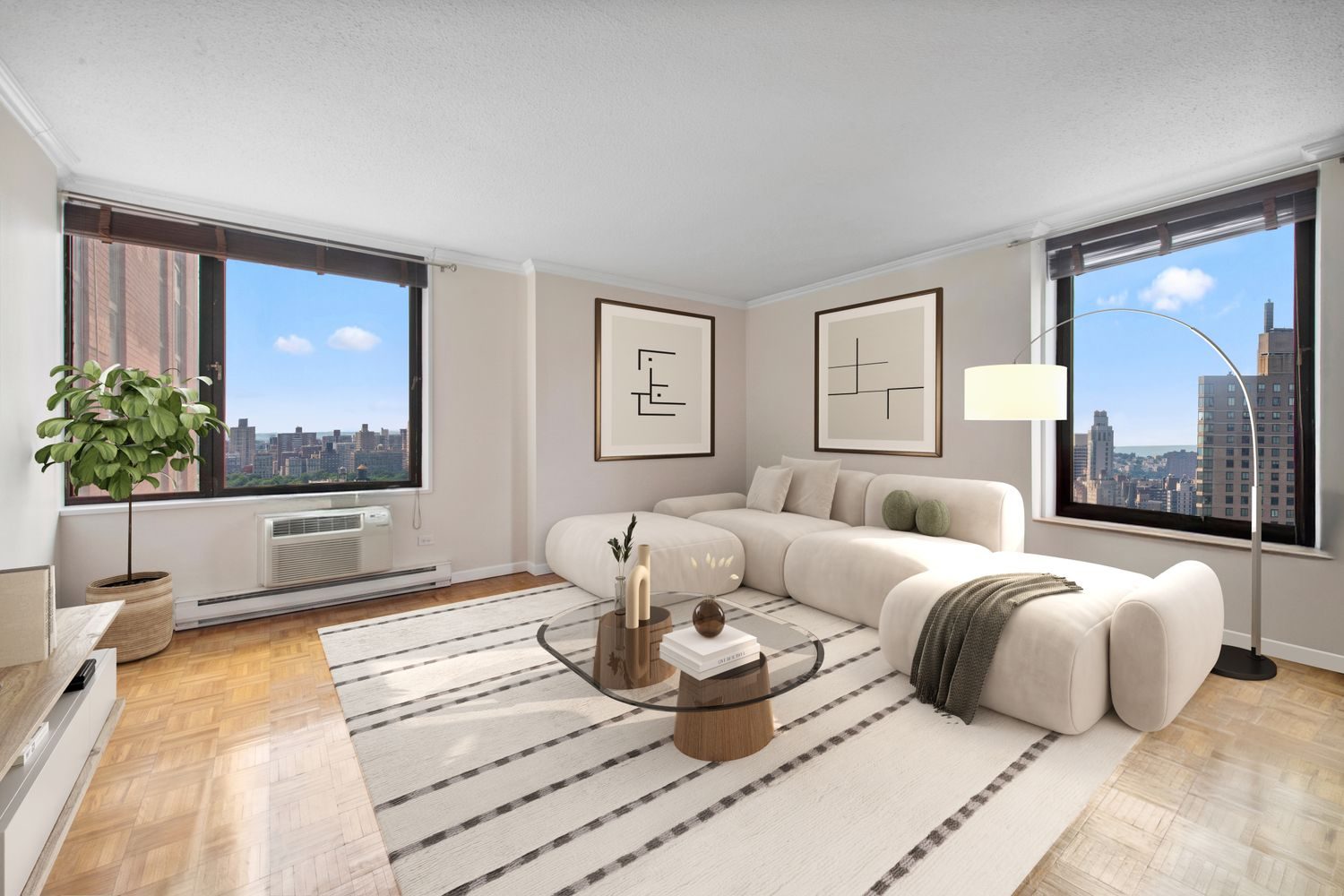 Living room with corner windows and city views at 1623 3rd Avenue on the Upper East Side